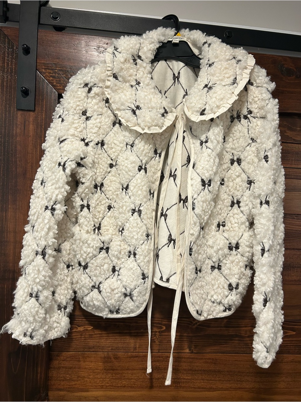 Francesca's Collections Cream Bouclé Teddy Jacket with Black Bow Accents